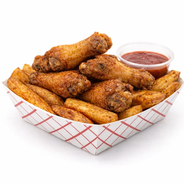 Crispy fried chicken wings and seasoned potato wedges in a paper tray with a side of dipping sauce.